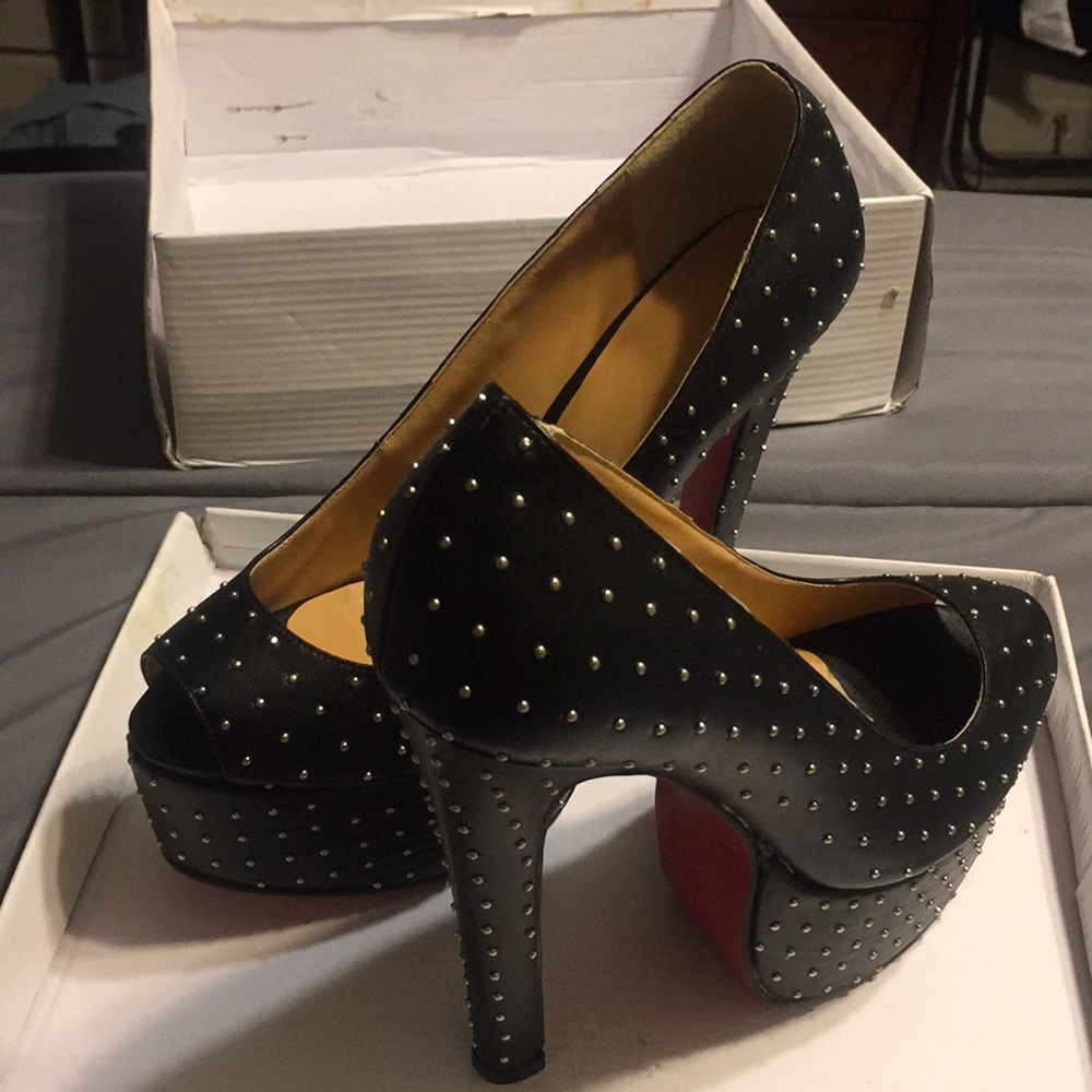 Black studded red bottom Platform stilettos